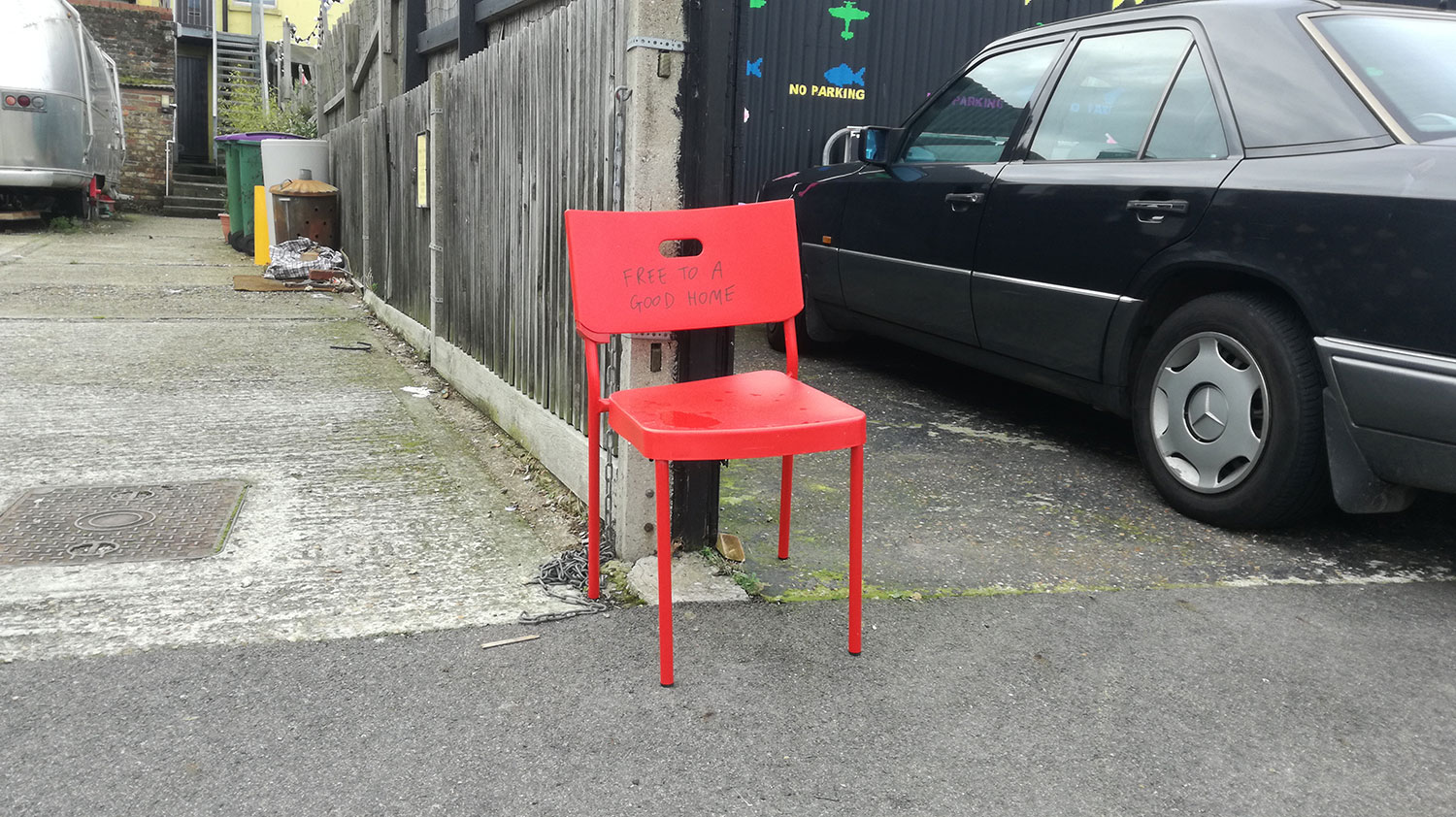 #008 - Media: Marker pen on red chair.